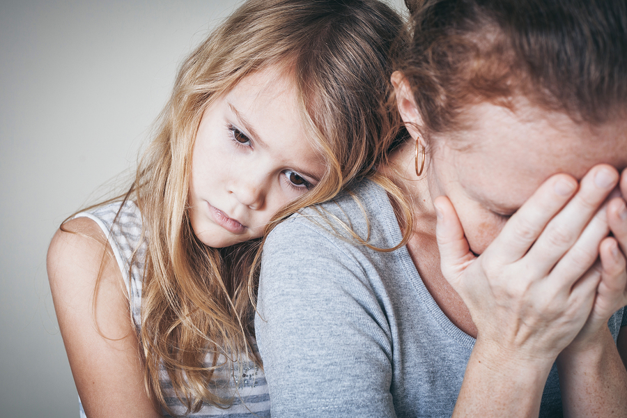 child hugging mom untreated depression